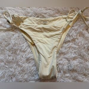 Monday Swimwear Pale Yellow Bikini Bottom with Subtle Logo